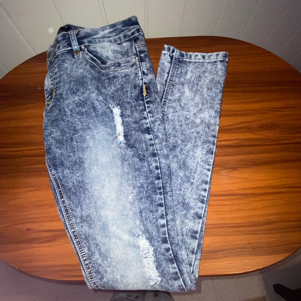 Distressed jeans with a worn look